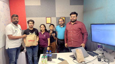upGrad Ahmedabad office - student and parents with the counselling team after their study abroad session